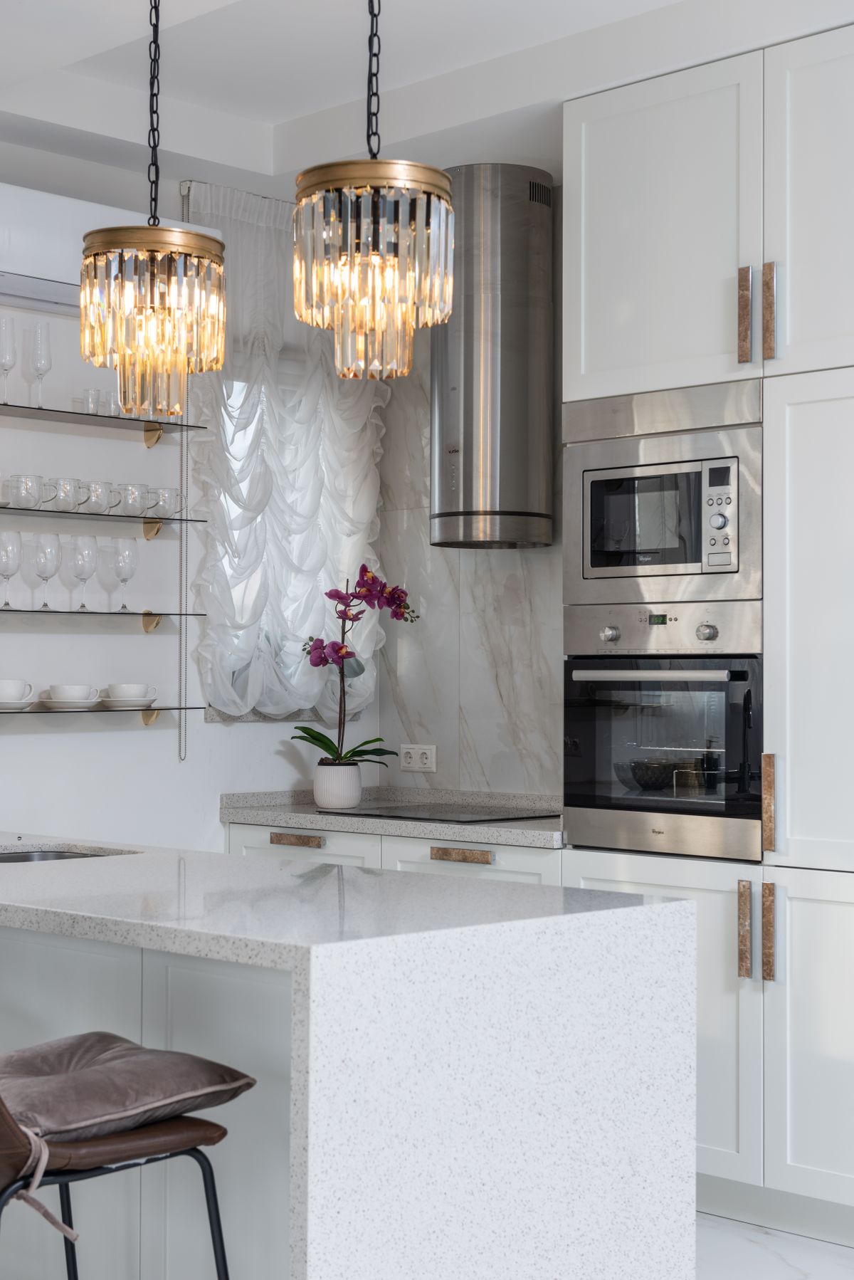 Bright white kitchen with modern appliances